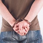 hands-in-handcuffs-1462608525wfO